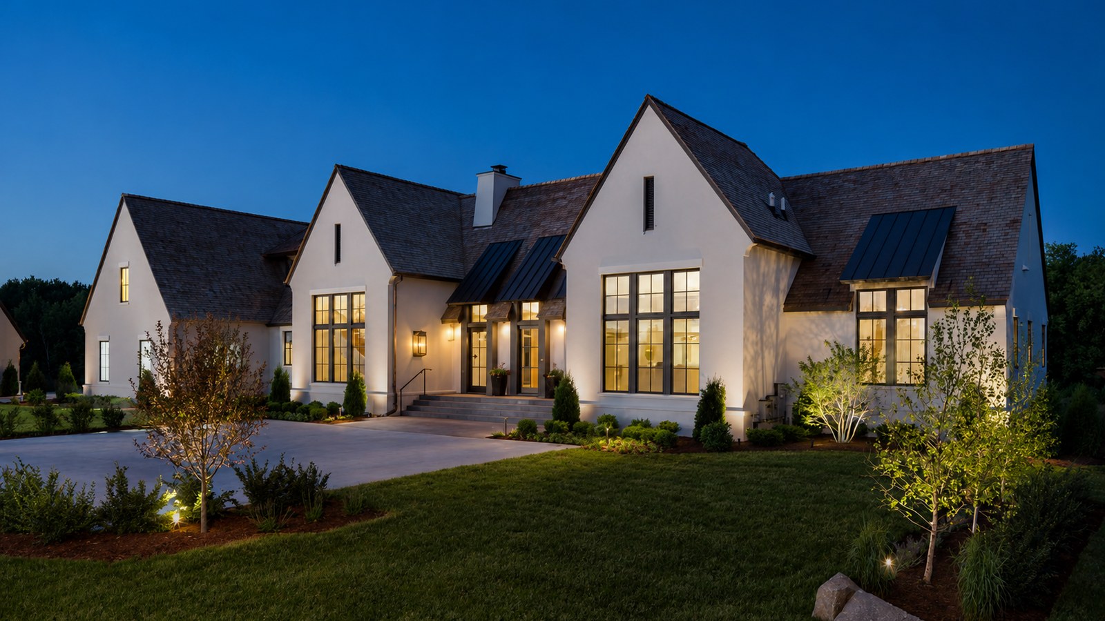 Sioux Falls area home lit at dusk, from the Mike Schmidt Keller Williams Realty website