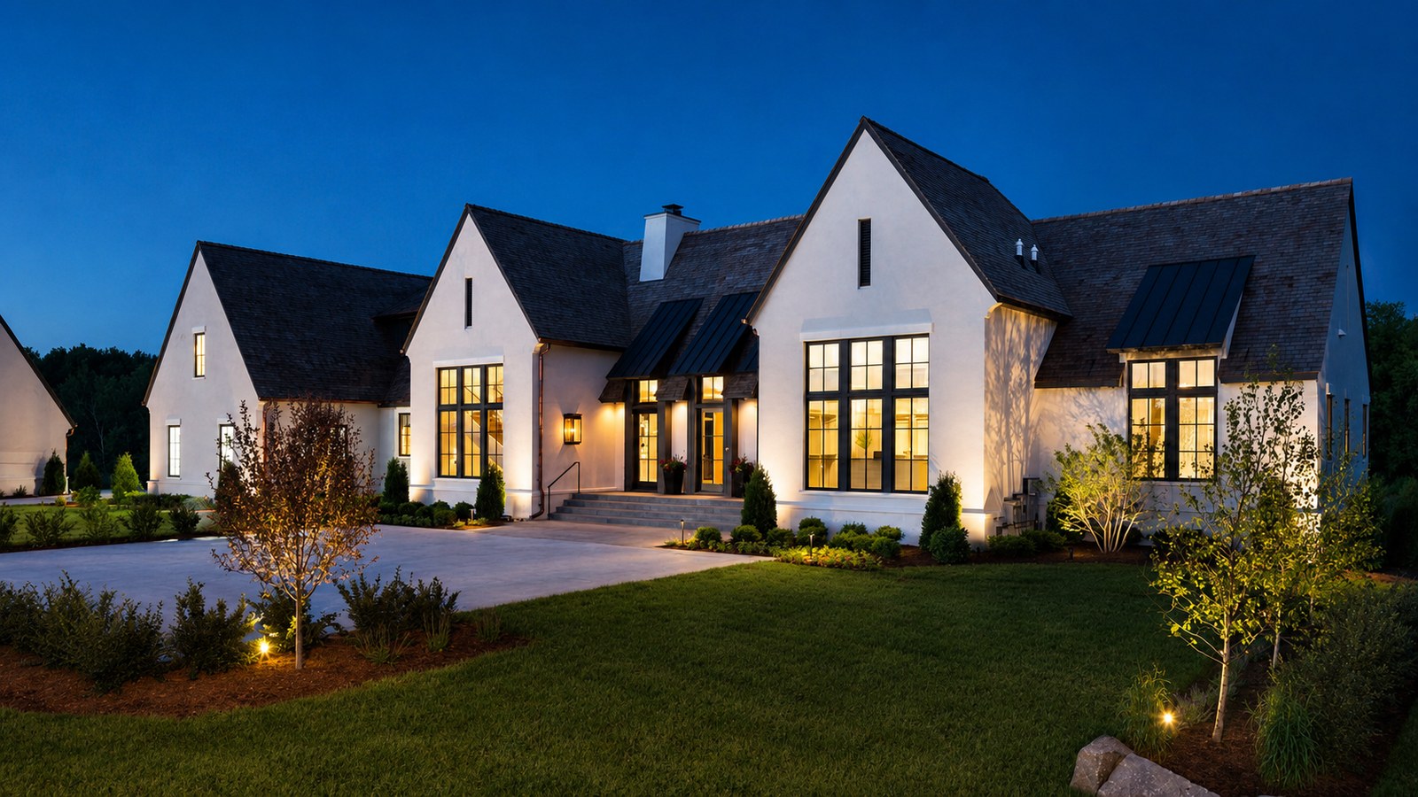 Sioux Falls area home lit at dusk, from the Mike Schmidt Keller Williams Realty website