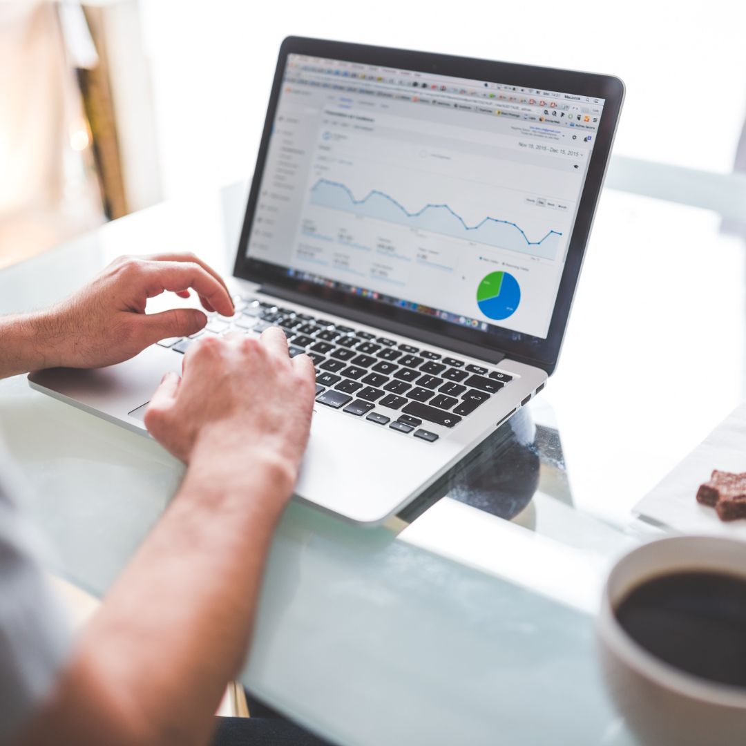 Magnifying glass over keywords, symbolizing in-depth keyword research for SEO optimization.