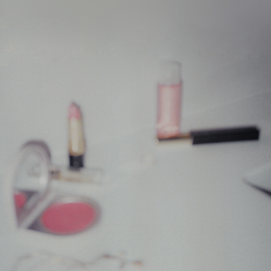 Assortment of skincare bottles and tubes, with textures and ingredients, capturing the essence of summer skincare essentials for a glowing complexion.