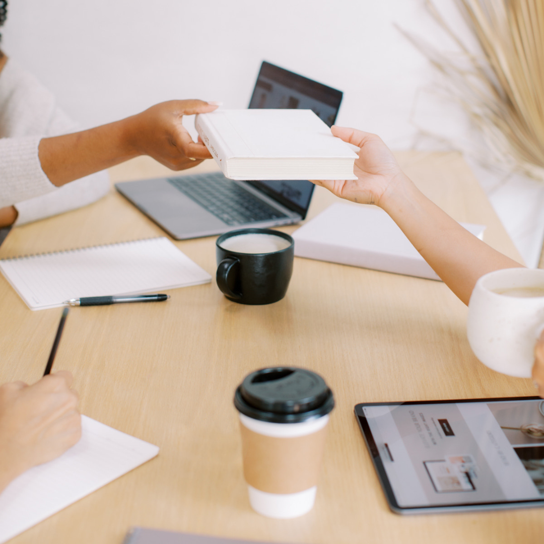 Entrepreneur contemplating team expansion with a strategic plan in hand