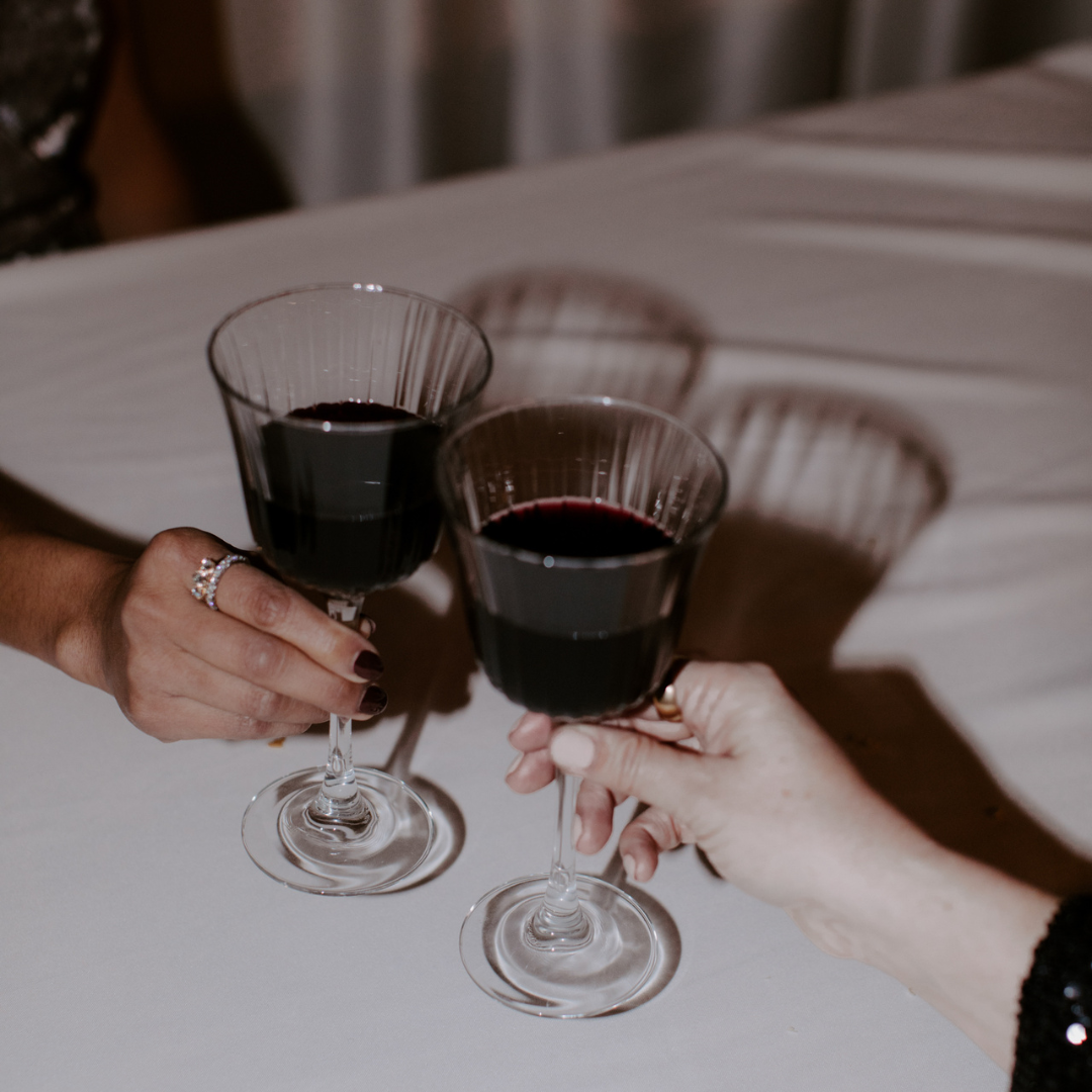 A diverse group of professionals engaging in a networking event, symbolizing the power of building business relationships for growth and success.