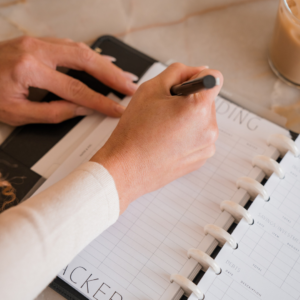 Illustration of a productive workspace with a clear desk, a planner, a healthy plant, and a clock showing time management