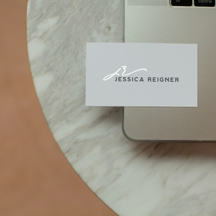 Graphic designer working on a logo design on a tablet