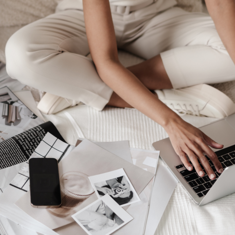 Professional website design on a laptop with various web design elements displayed